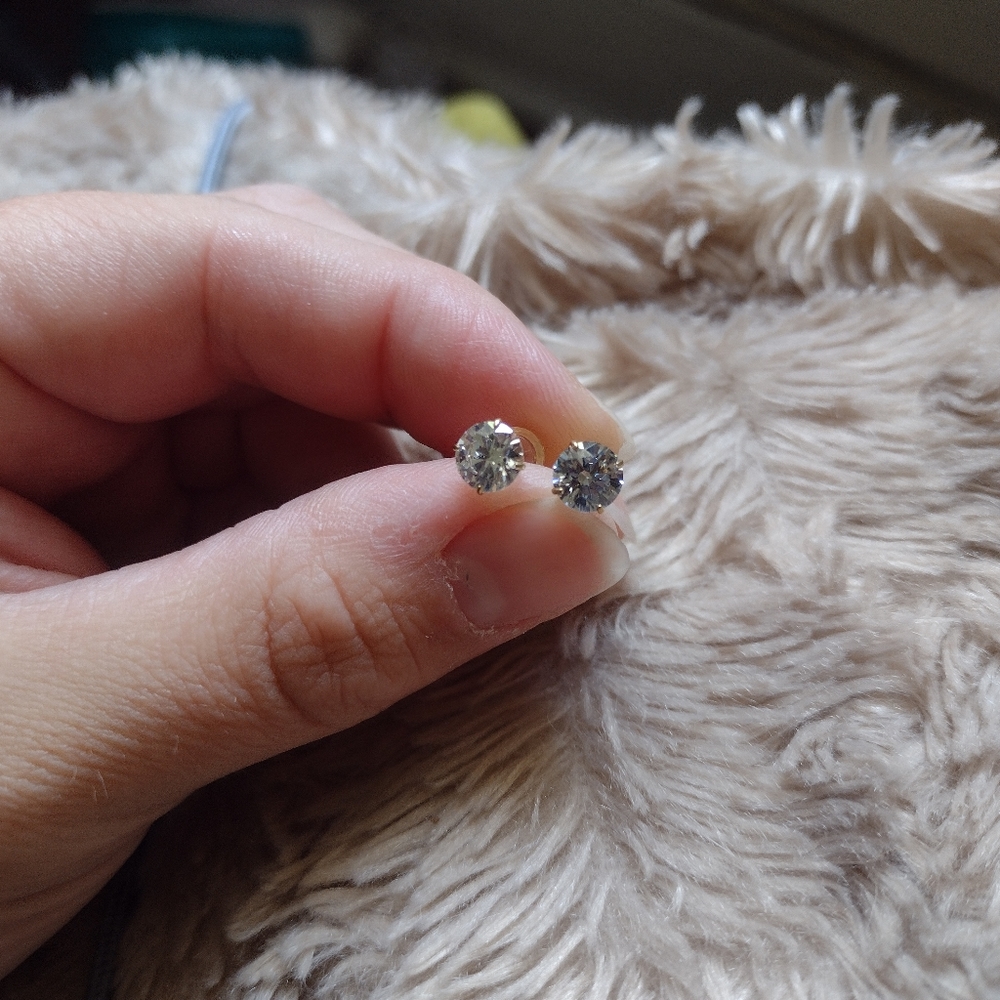 Gold stud earrings